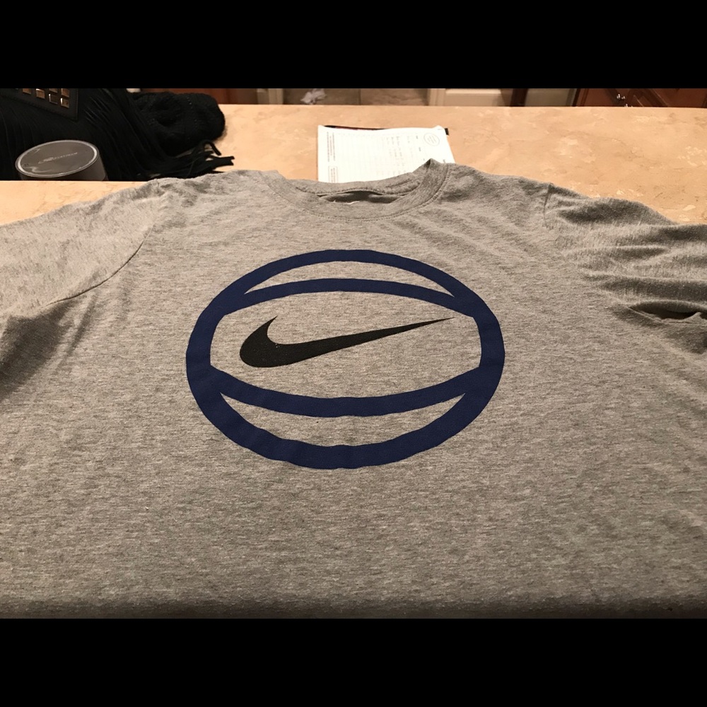 Boys XL Nike shirts.